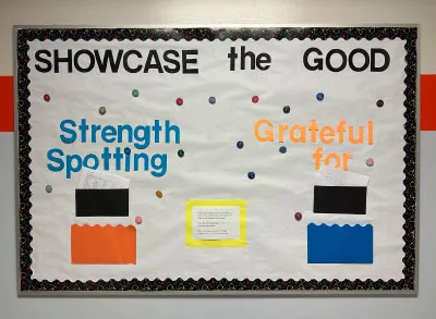 6.29.23_ShowcaseBB Bulletin board with Showcase the Good, strength spotting, and grateful for