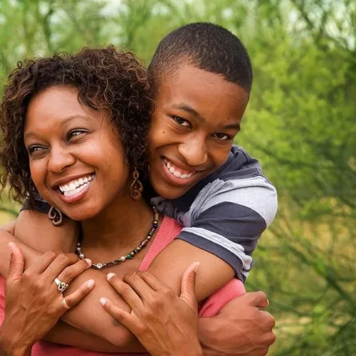 Showcase the Good featured image, Showcase the good. Teenage son is hugging mother