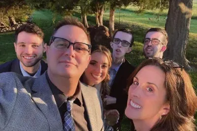 400x293_Theresa&Fam The Forthofer family, smiles for a selfie on a walk in a park. The photo is of Theresa, her husband, her daughter and her husband, and her two sons, Ryan and Justin.