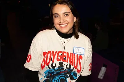 400x293_Lily_POVAutisticJoy (1) Lily Newton is wearing a white t-shirt and smiling