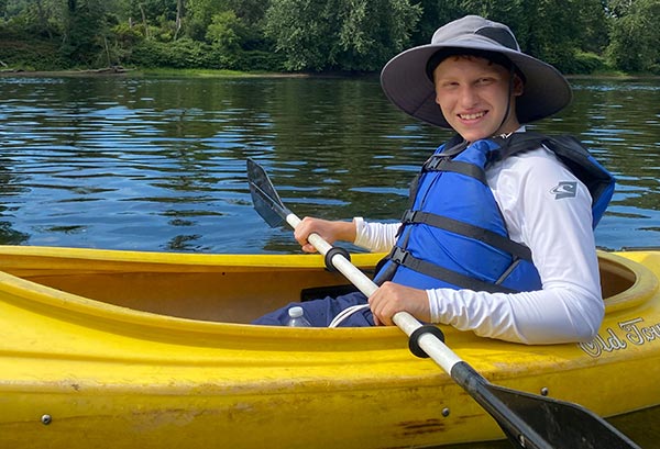 young man in a kayak