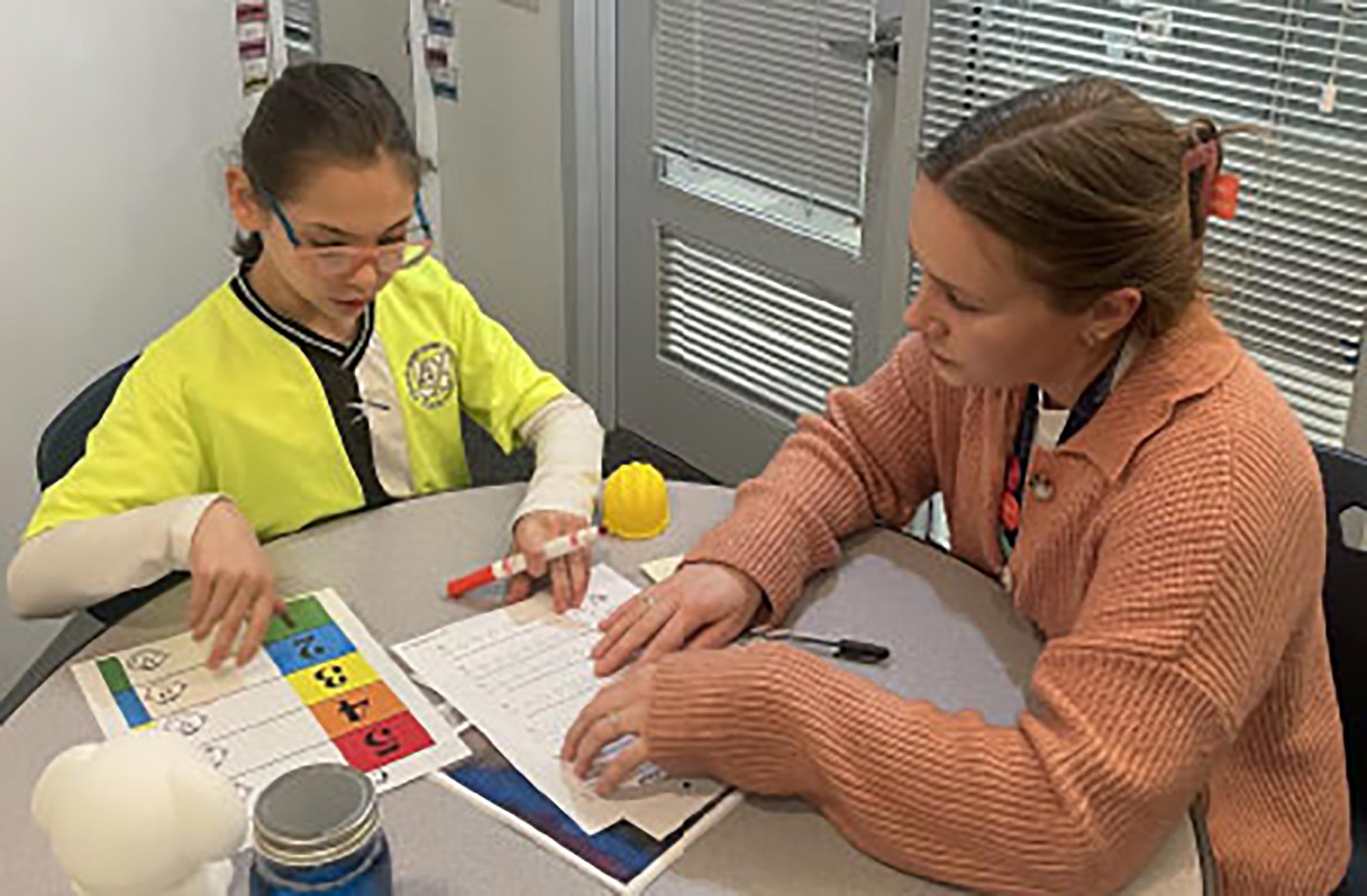 Cove student and teacher