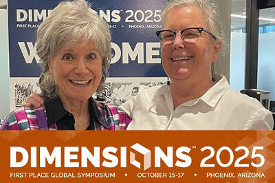 400x293_GlobalSymp2 Patricia poses with someone at the Global Symposium