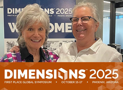 400x293_GlobalSymp2 Patricia poses with someone at the Global Symposium