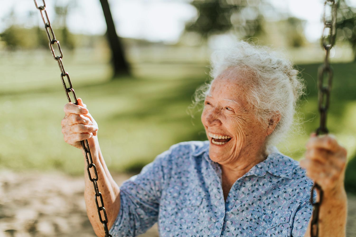 older woman on a swing